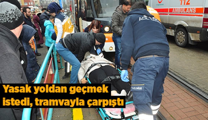 Yasak yoldan geçmek istedi, tramvayın altında kalıyordu