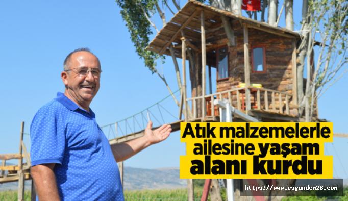 Atık malzemelerle ailesine yaşam alanı kurdu