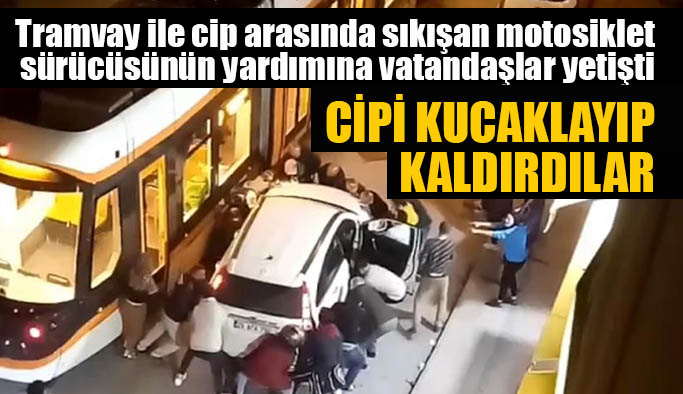 Sıkışan motosiklet sürücüsünü kurtarmak için cipi böyle kucakladılar