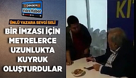 BİR İMZASI İÇİN METRELERCE UZUNLUKTA KUYRUK OLUŞTURDULAR