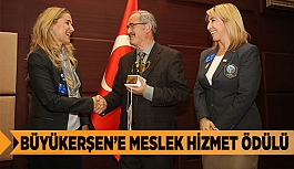 BÜYÜKERŞEN’E MESLEK HİZMET ÖDÜLÜ