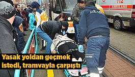 Yasak yoldan geçmek istedi, tramvayın altında kalıyordu