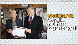 Sivrihisar'da 45 yıllık muhtara başarı belgesi