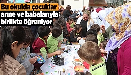 Bu okulda çocuklar anne ve babalarıyla birlikte öğreniyor