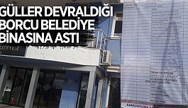 GÜLLER DEVRALDIĞI BORCU BELEDİYE BİNASINA ASTI