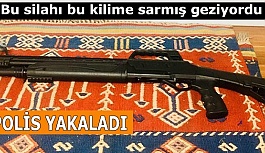 Kilime sardığı ruhsatsız av tüfeğiyle dolaşan zanlı gözaltına alındı