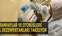 TRAMVAYLAR VE OTOBÜSLERE  EL DEZENFEKTANLARI TAKILIYOR