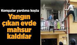 Yangın çıkan evde mahsur kalan çifti komşuları kurtarmaya çalıştı