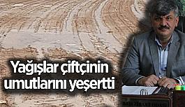 Ekili tarlaların üzerinde oluşan su birikintileri, üreticinin yüzünü güldürdü