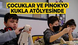 Çocuklar ve Pinokyo kukla atölyesinde